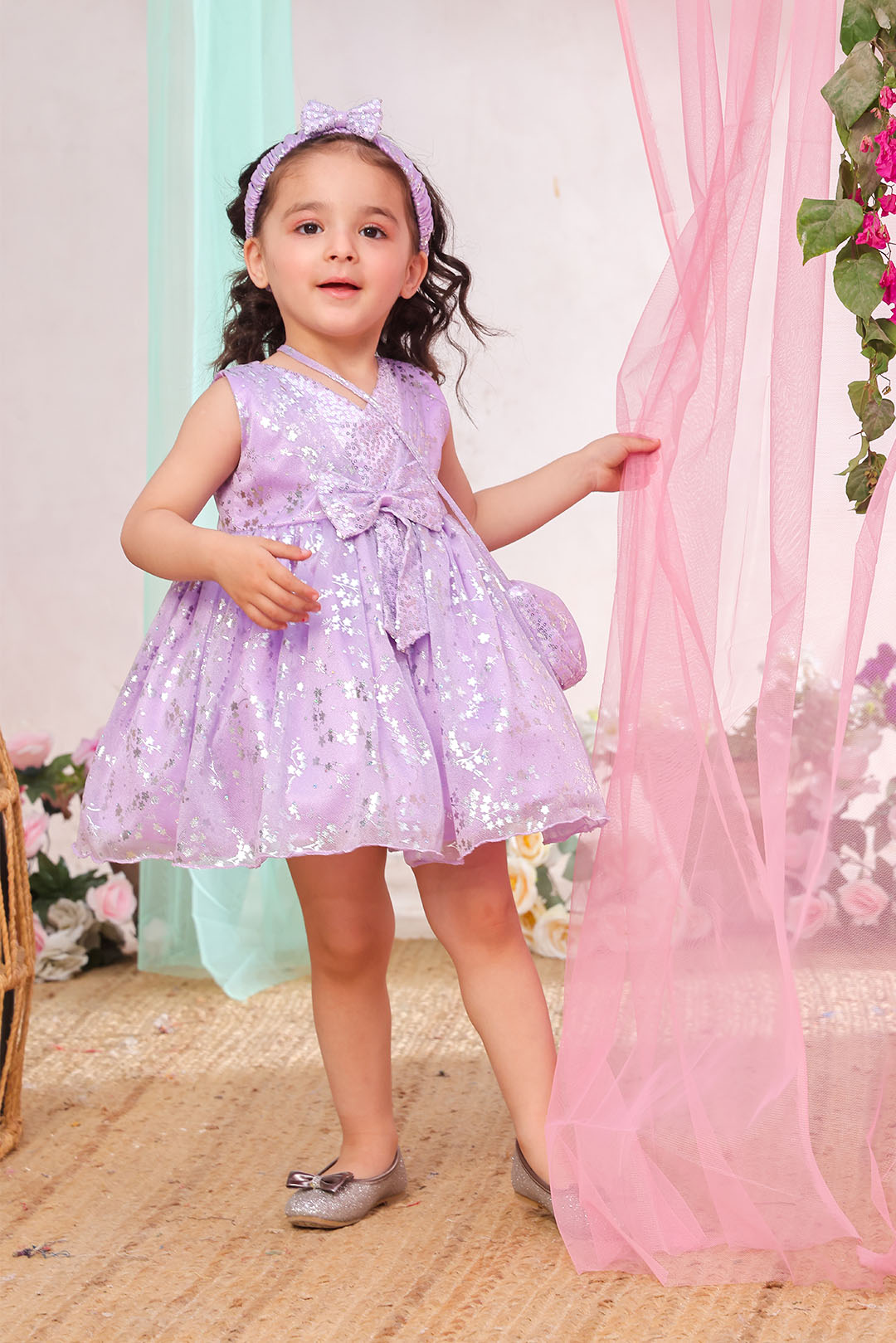SANA'S purple printed net frock Pakistan Eid