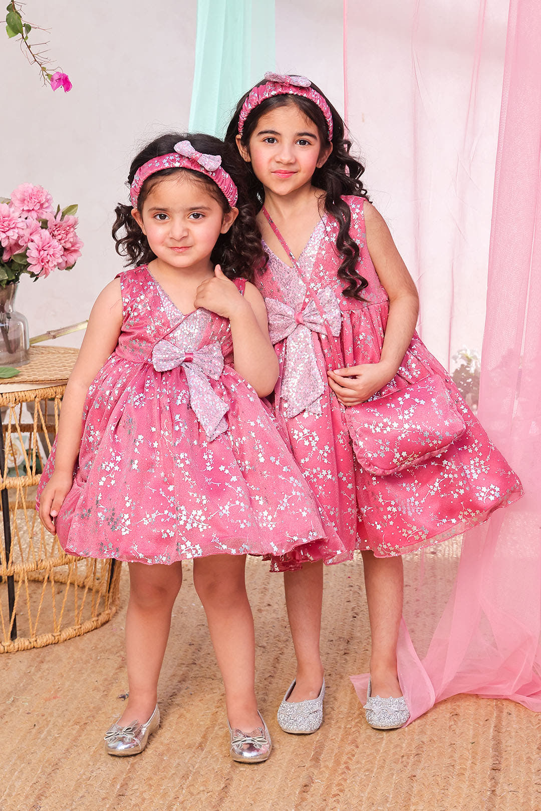 SANA'S pink printed net frock Pakistan Eid
