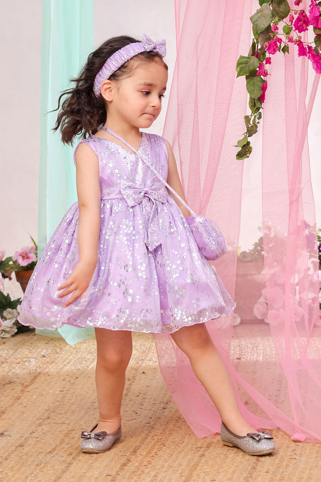 SANA'S purple printed net frock Pakistan Eid