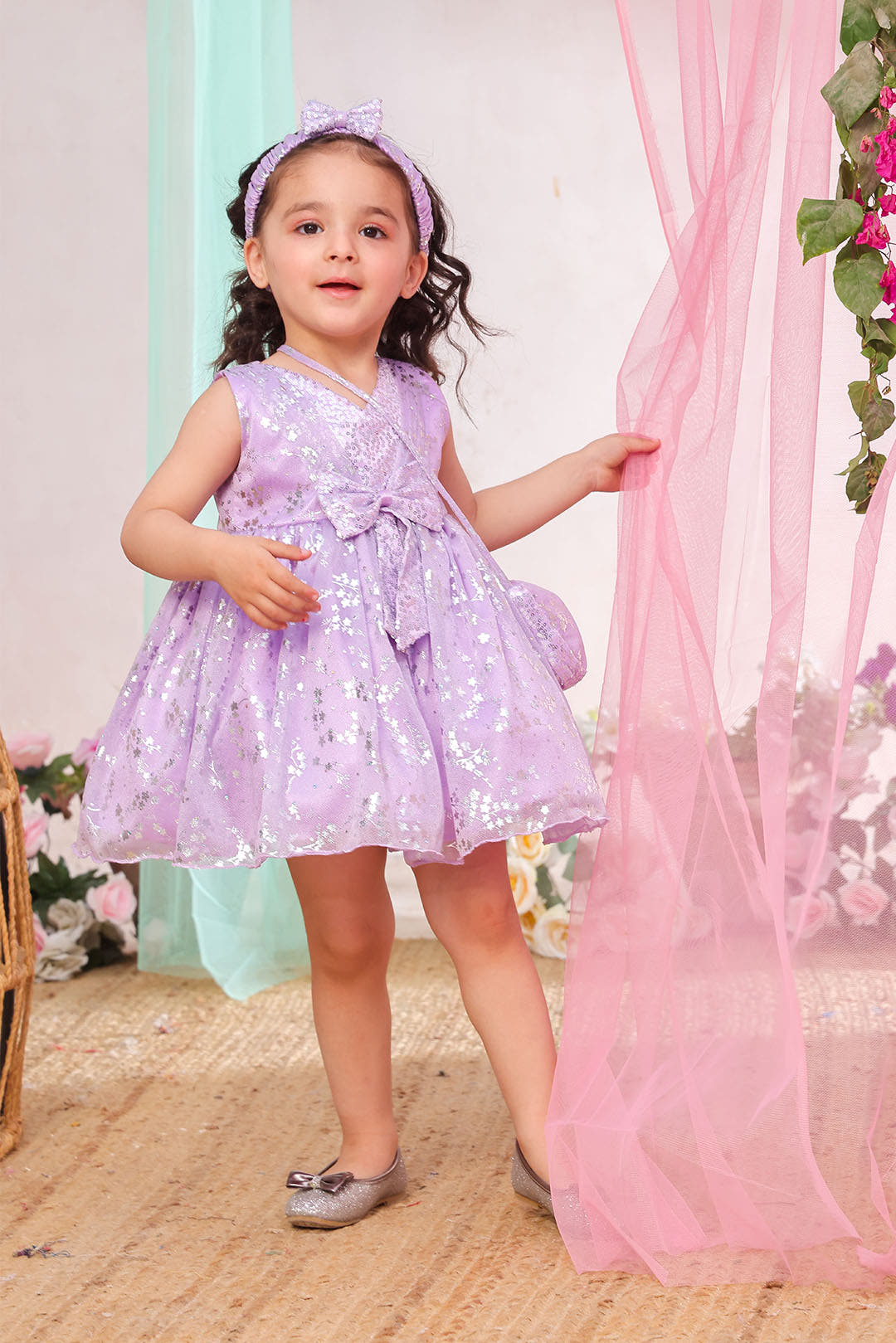 SANA'S purple printed net frock Pakistan Eid