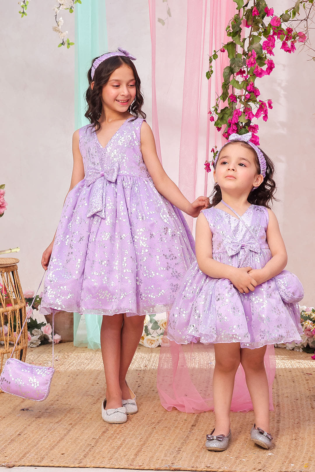 SANA'S purple printed net frock Pakistan Eid
